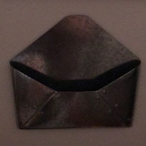 Silver envelope wall decor